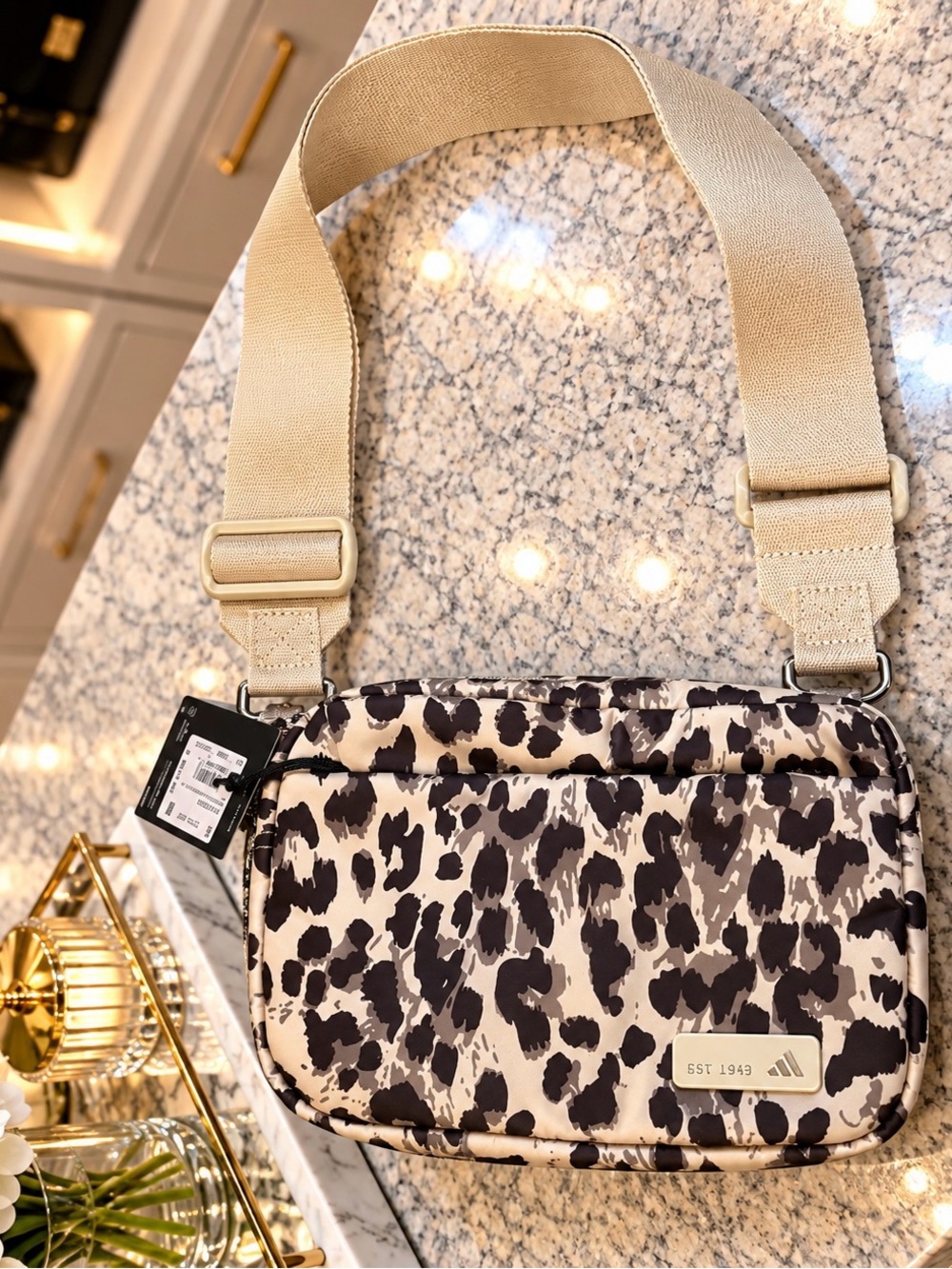 Adidas Luxe Crossbody in the leopard crystal linen / dark brown / beige